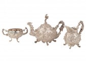 THREE-PIECE SIAMESE SILVER TEA