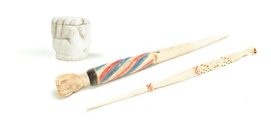 THREE PIECES OF CARVED IVORY. 