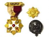 Three pieces of jewelry includ