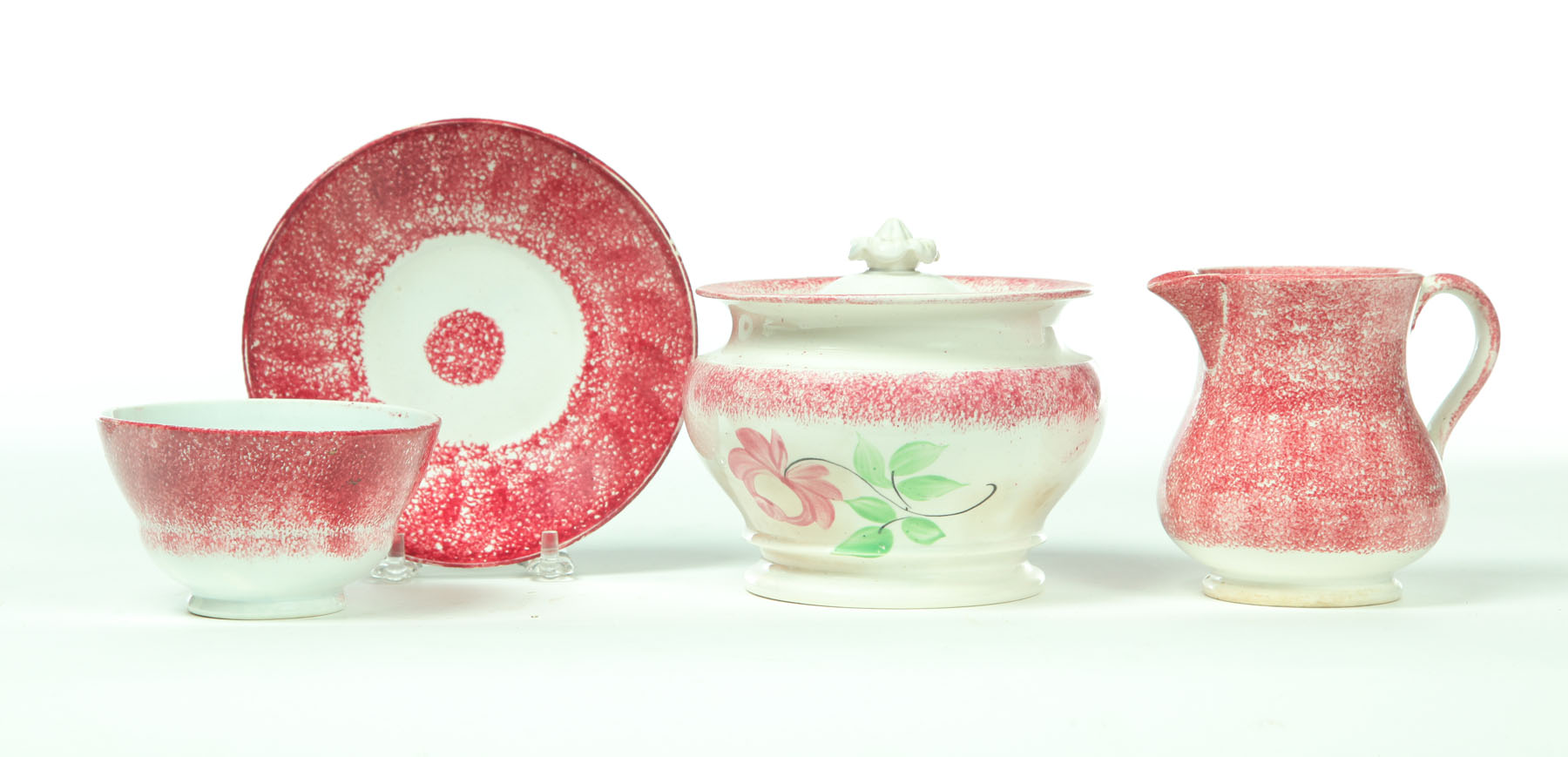 THREE PIECES OF RED SPATTERWARE. 