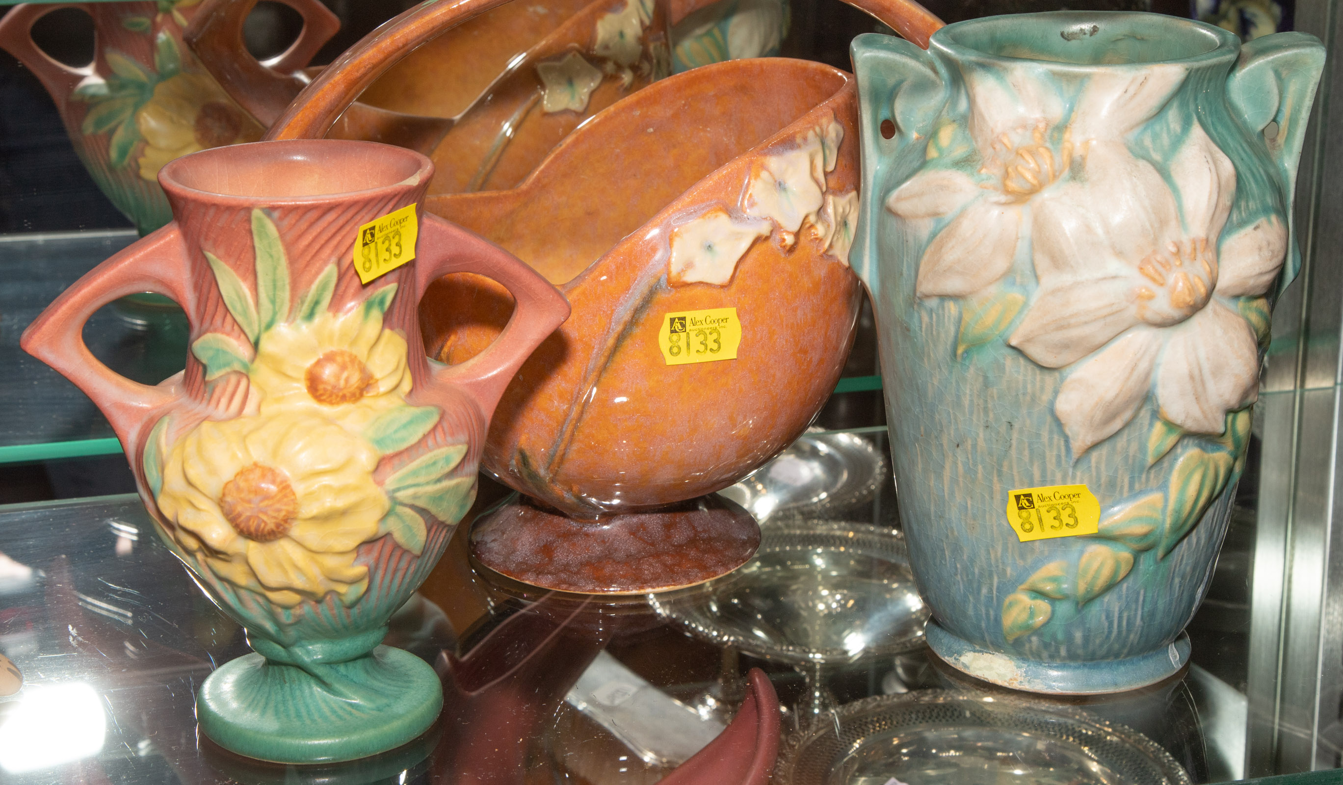 THREE PIECES OF ROSEVILLE POTTERY .
