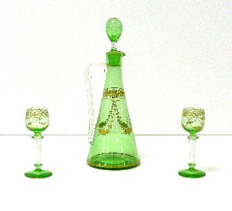 Three pieces pale green and gilt