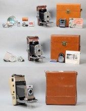 THREE POLAROID CAMERAS WITH AC