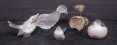 Three porcelain and one glass