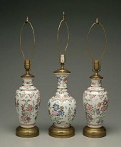Three porcelain lamps: two por