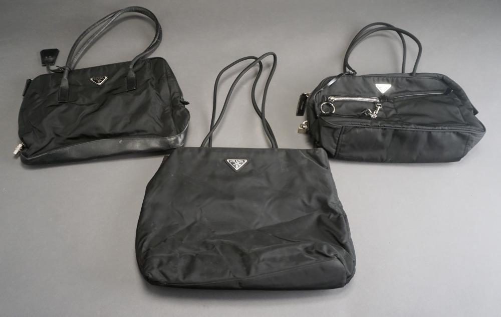 THREE PRADA BLACK NYLON AND LEATHER