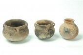 THREE PREHISTORIC POTTERY JARS