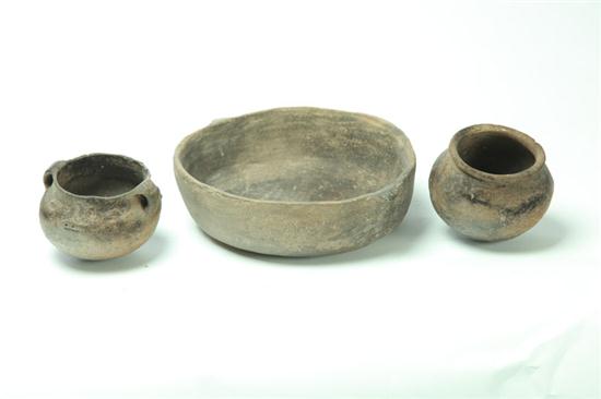 ***THREE PREHISTORIC POTTERY JARS.