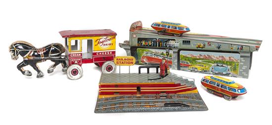 Three Pressed Tin Toys comprising a