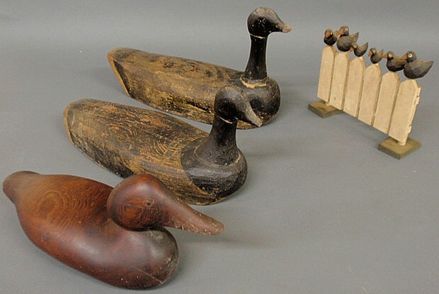 Three primitive carved duck