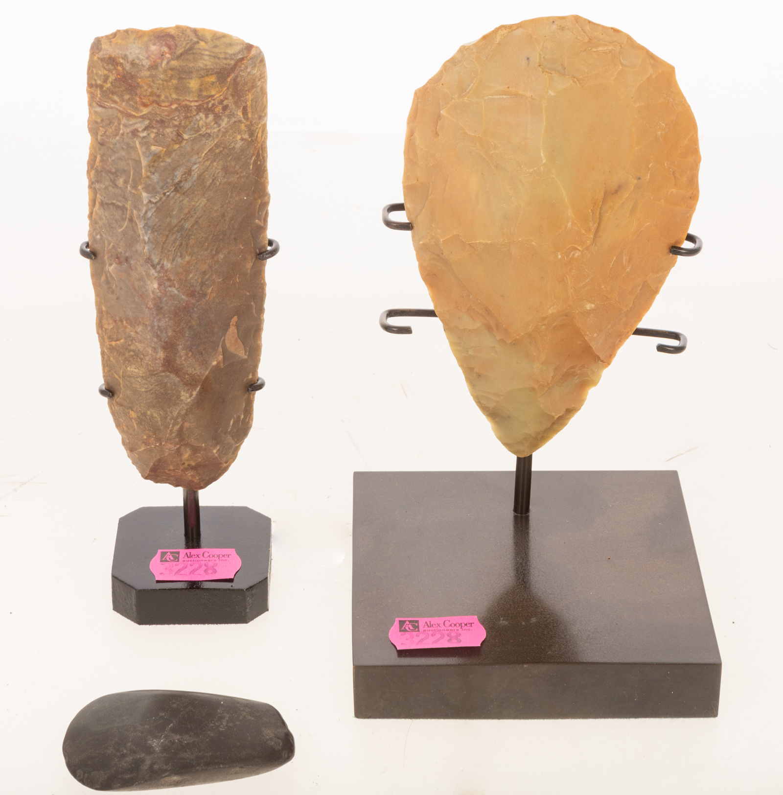THREE PRIMITIVE STONE ARROWHEADS