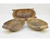 Three primitive wood trenchers