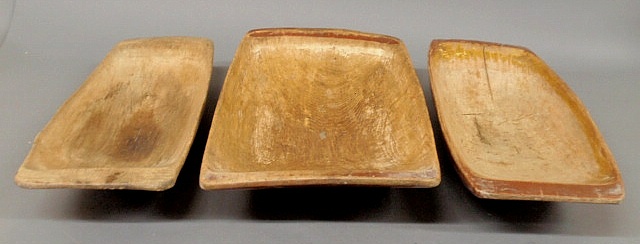 Three rectangular carved wood