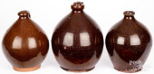 THREE REDWARE JUGS, 19TH C.<br