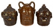 THREE REGGIE MEADERS FACE JUGS