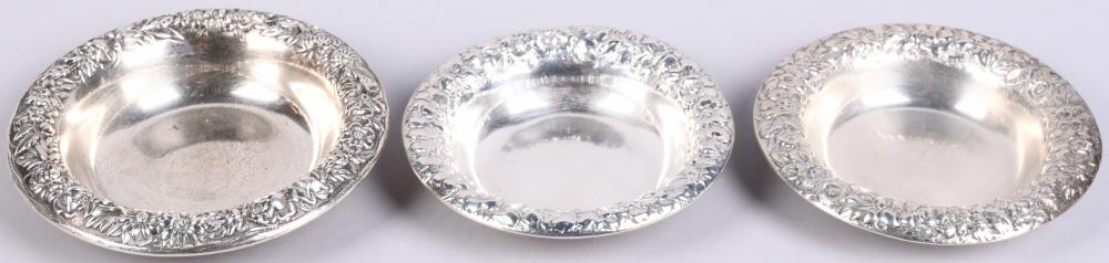 THREE REPOUSSE SILVER NUT