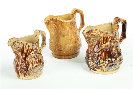 THREE ROCKINGHAM PITCHERS.  Two
