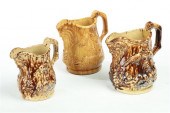 THREE ROCKINGHAM PITCHERS.  Tw