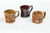 THREE ROCKINGHAM SHAVING MUGS.
