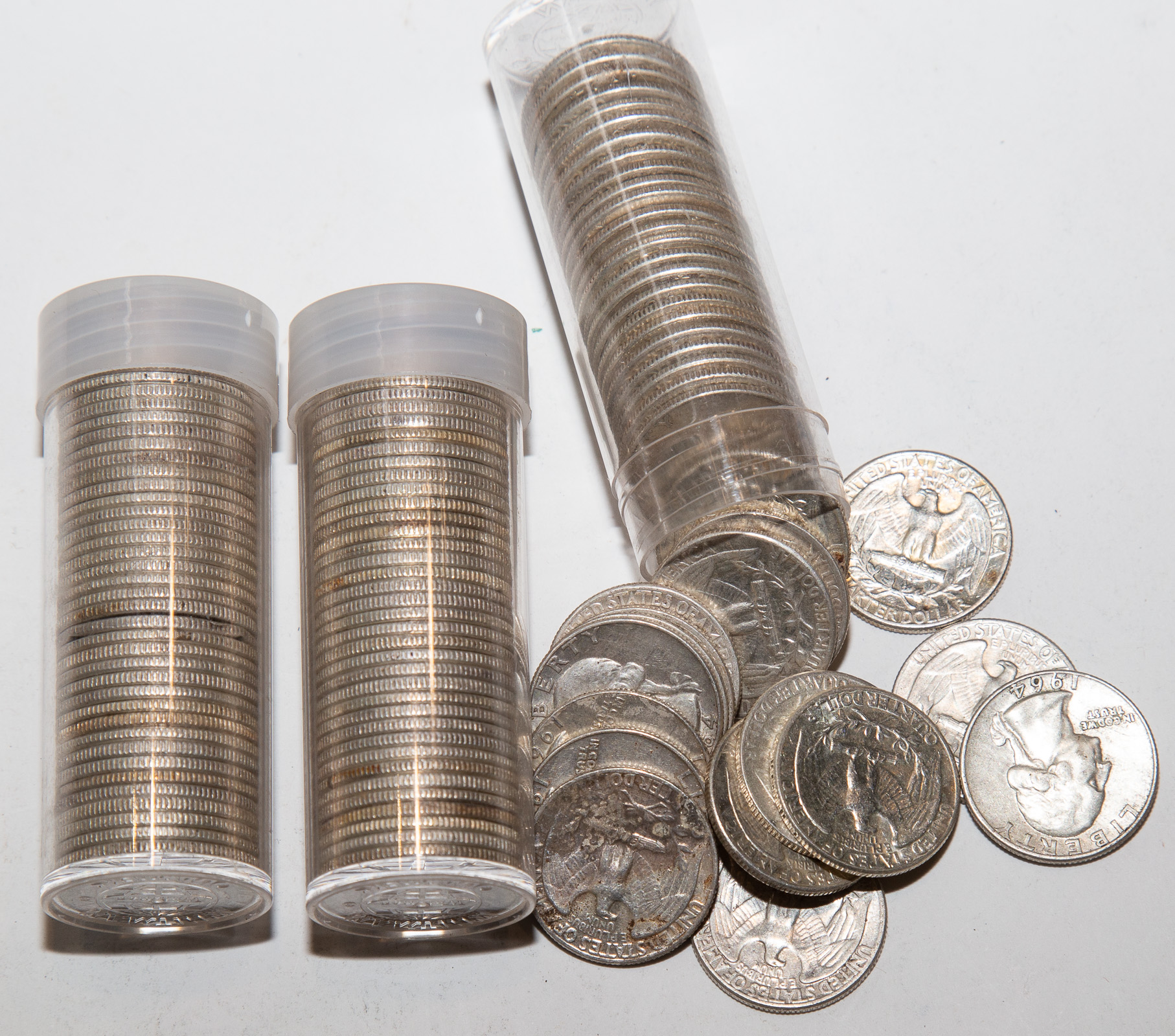 THREE ROLLS OF SILVER QUARTERS