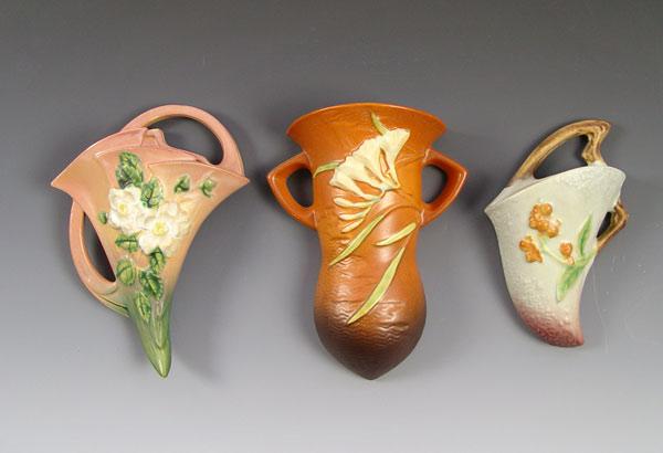 THREE ROSEVILLE POTTERY WALL