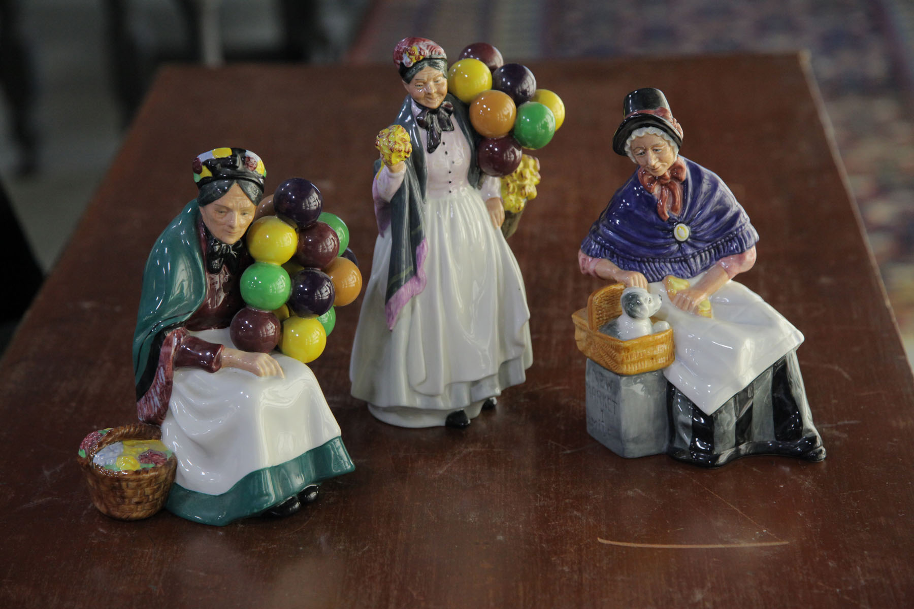 THREE ROYAL DOULTON FIGURES. 