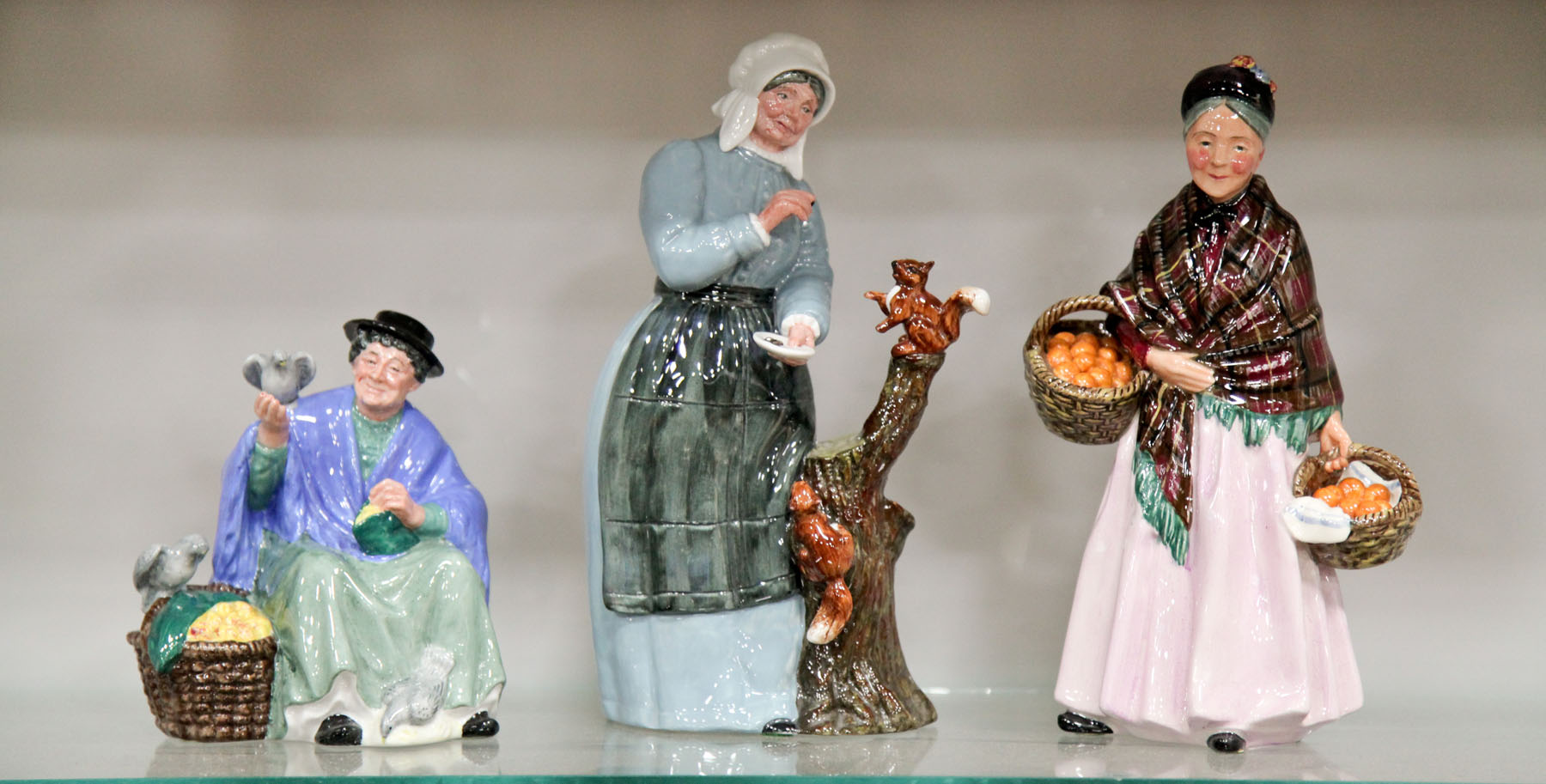 THREE ROYAL DOULTON FIGURINES. 
