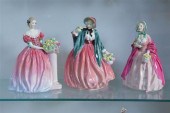 THREE ROYAL DOULTON FIGURINES.