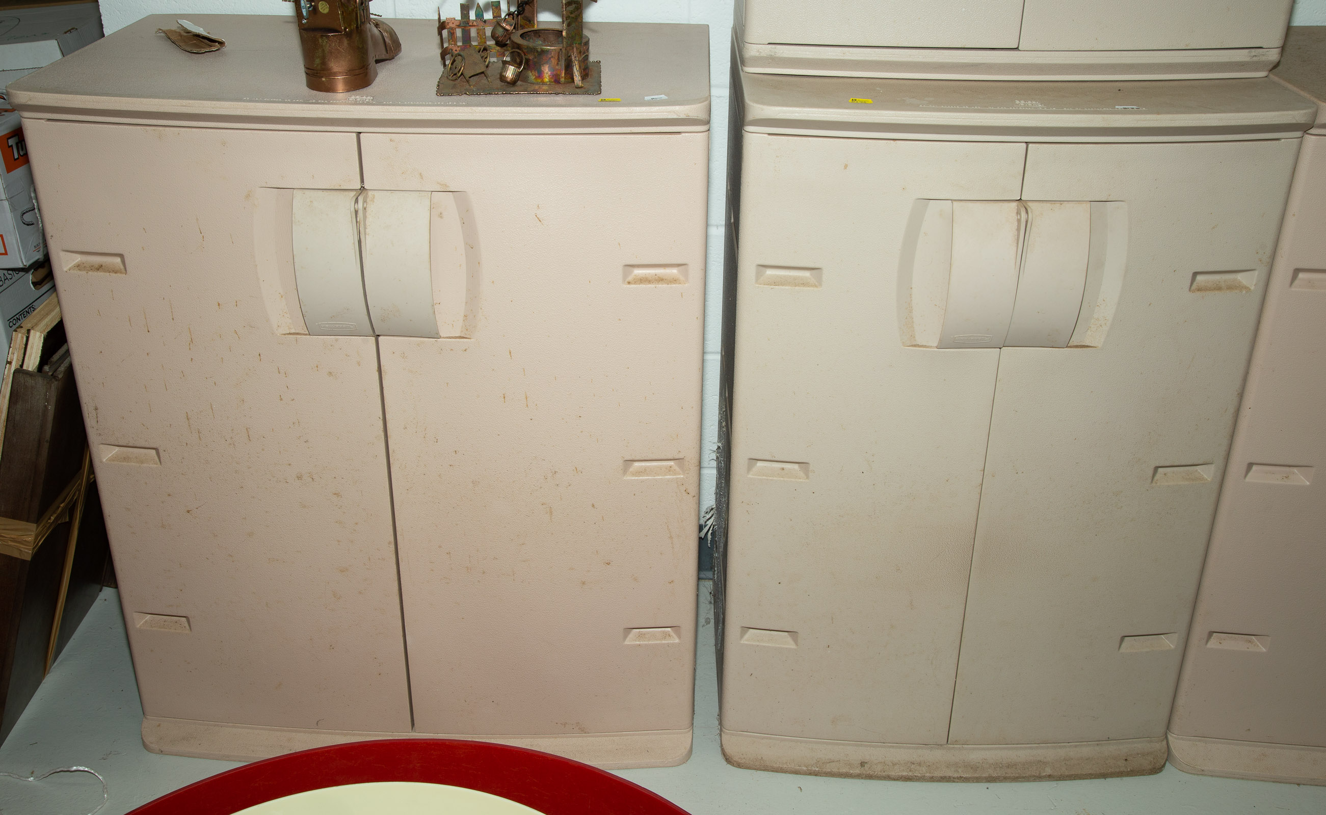 THREE RUBBERMAID STORAGE CABINETS .