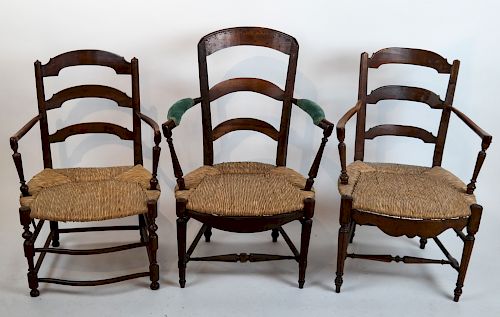 THREE RUSH SEAT ARMCHAIRSThree
