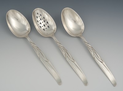 Three Serving Spoons in the
