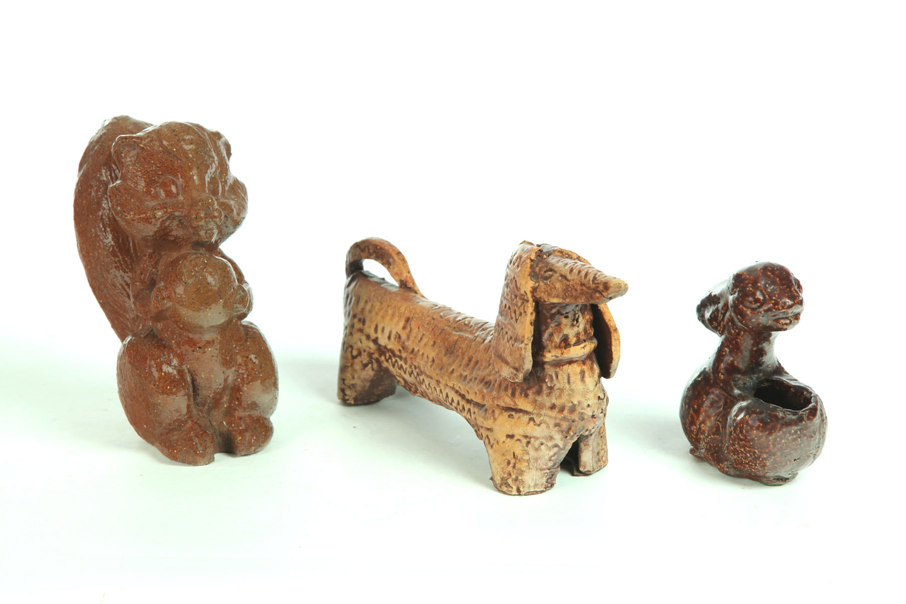 THREE SEWERTILE ANIMALS.  American