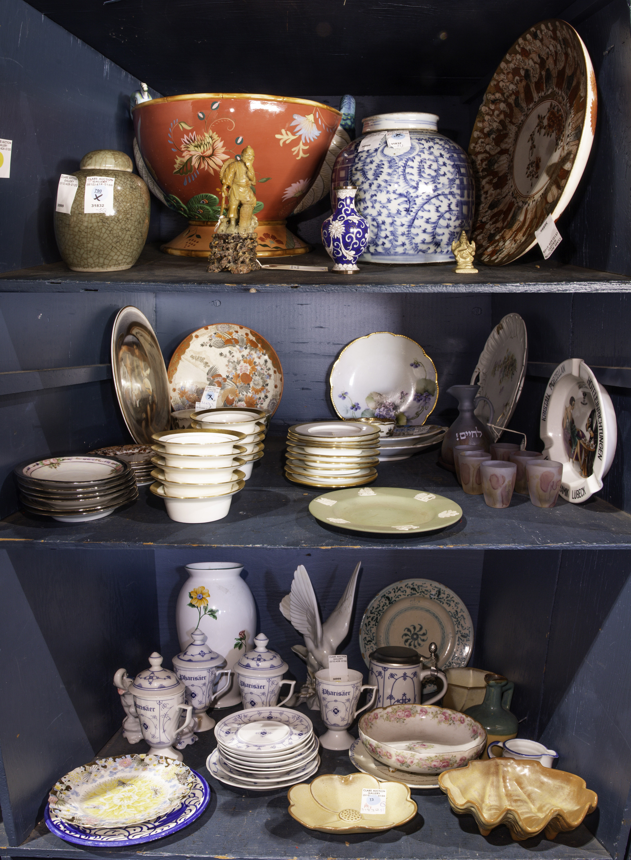 THREE SHELVES OF ASSOCIATED