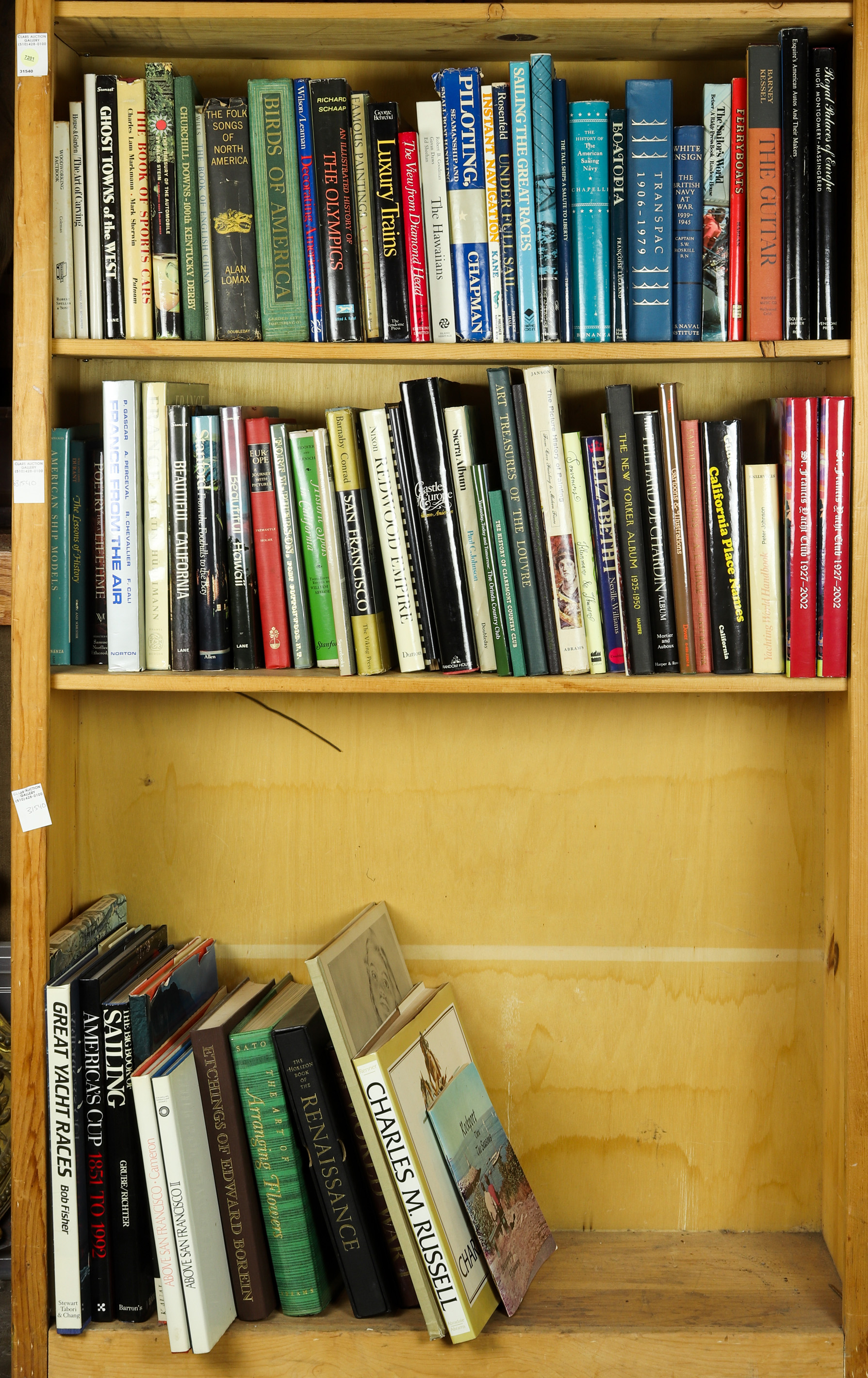 THREE SHELVES OF BOOKS MOSTLY