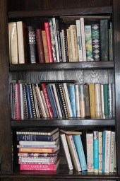 THREE SHELVES OF BOOKSThree Sh