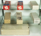 THREE SHELVES OF BOXES OF MISC