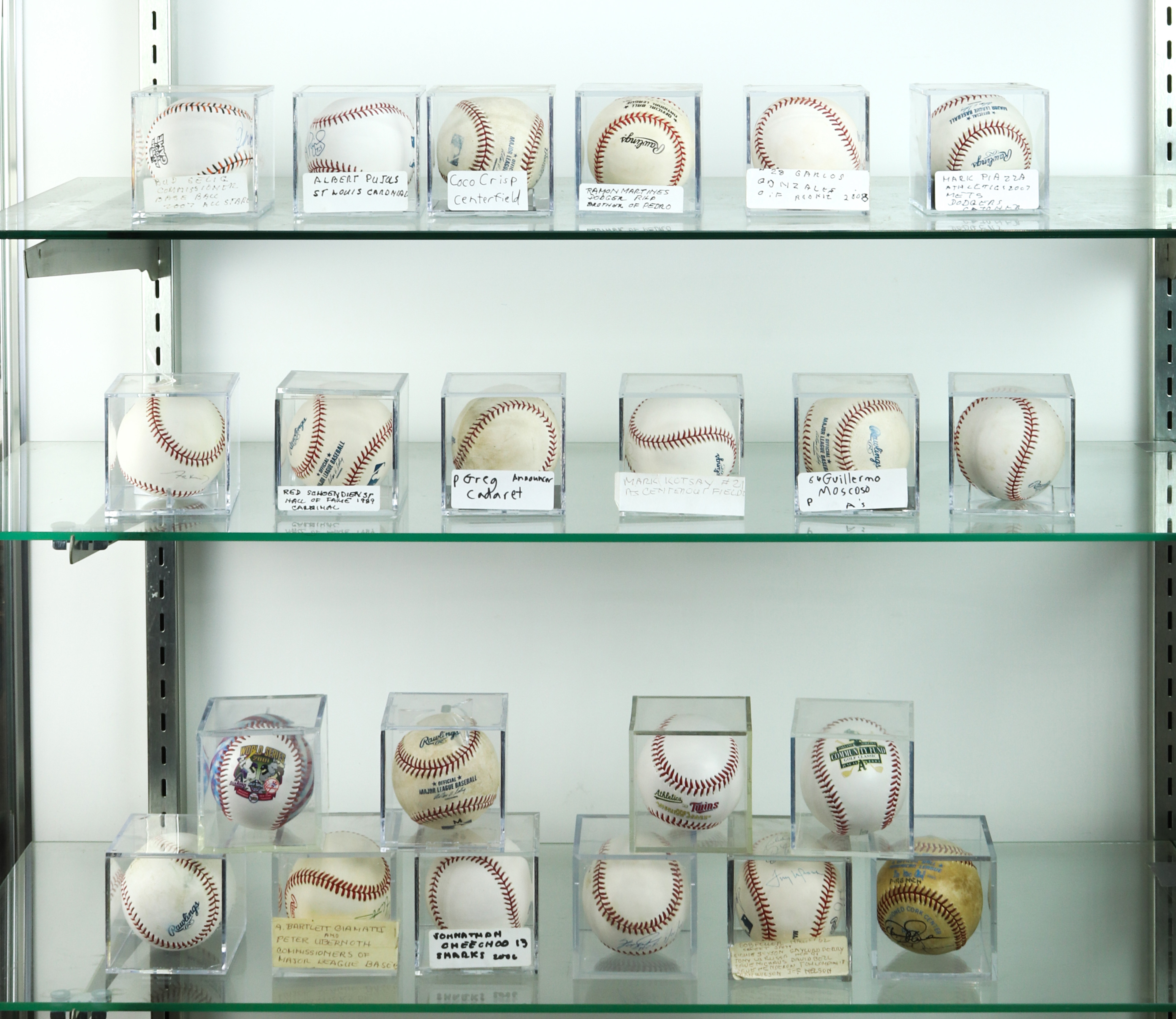 THREE SHELVES OF CASED AND SIGNED