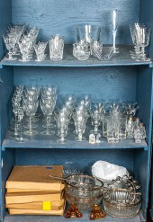 THREE SHELVES OF CRYSTAL STEMW
