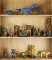 THREE SHELVES OF ETHNIC WOOD F