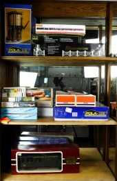 THREE SHELVES OF MODEL TRAINS