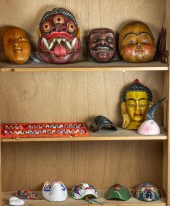 THREE SHELVES OF MOSTLY ASIAN