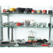 THREE SHELVES OF TRAIN CARS IN