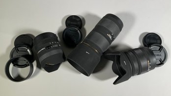 Three Sigma zoom lenses,