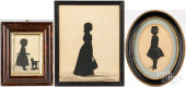 THREE SILHOUETTES OF CHILDREN<