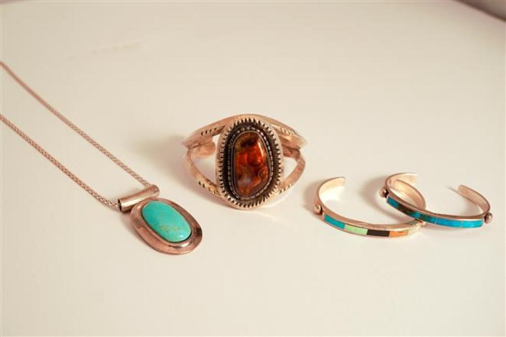 THREE SILVER CUFF BRACELETS AND A