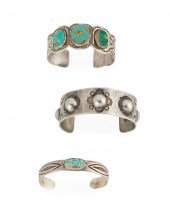 THREE SILVER CUFF BRACELETSThr