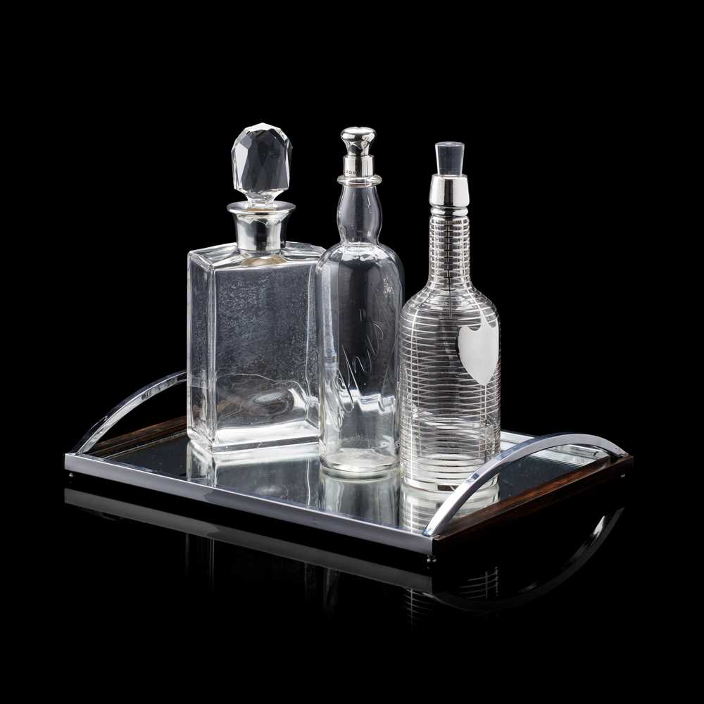 THREE SILVER MOUNTED DECANTERS