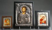 THREE SILVER MOUNTED ICONS PAN