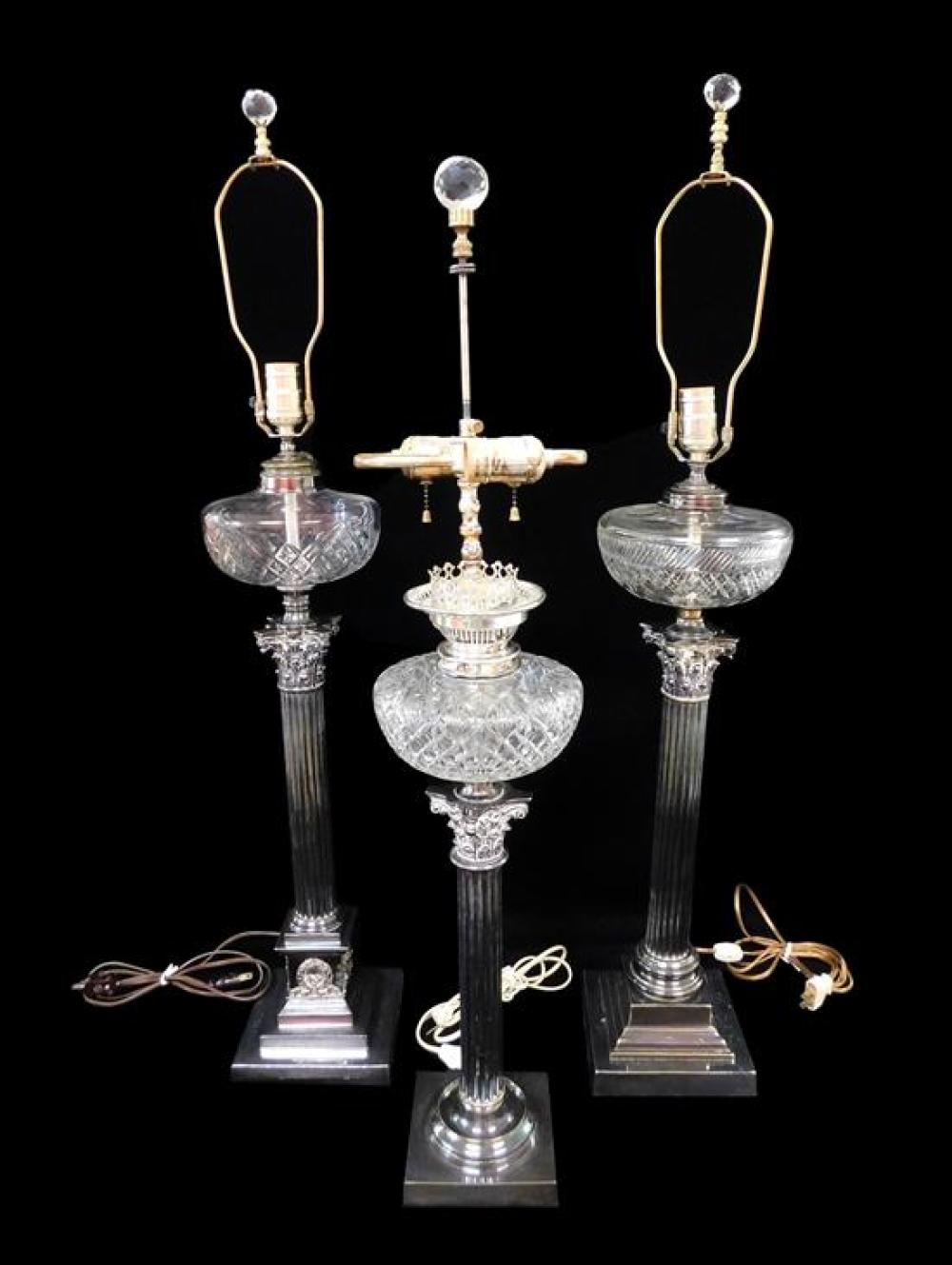 THREE SILVER-PLATE COLUMN LAMPS