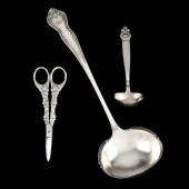 THREE SILVER-PLATED SERVERS Th